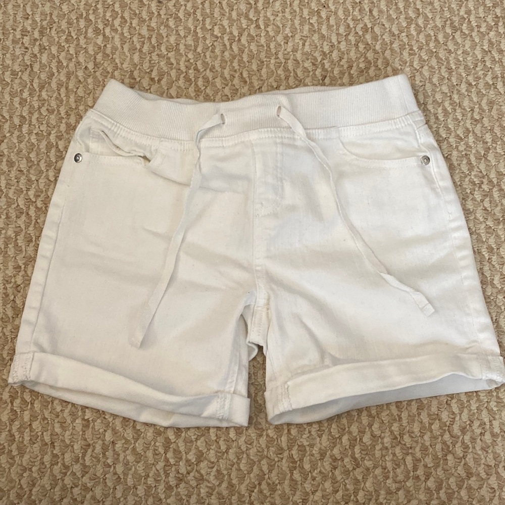 White justice shorts in size 14. Mid thigh length.